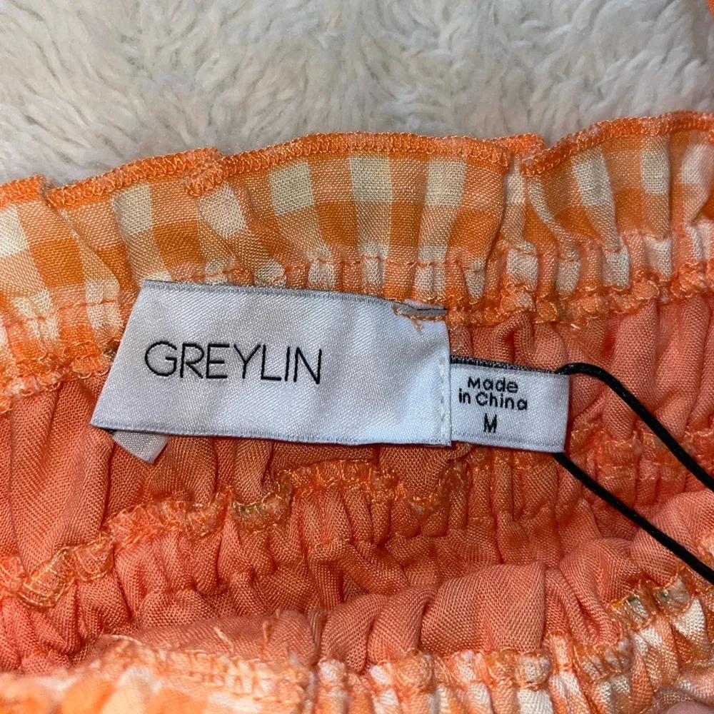 Greylin Orange Smocked Peplum Crop Top with Yellow Flower Pattern Detail - Picture 3 of 6